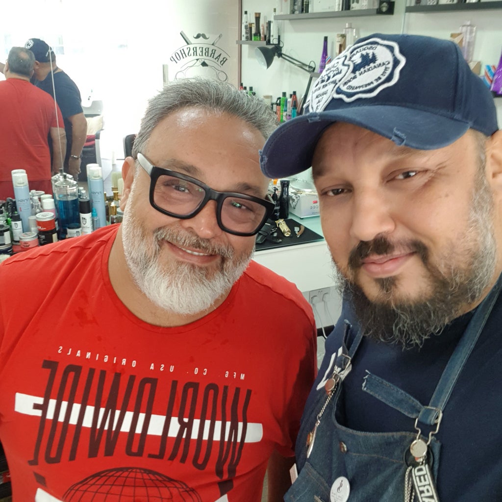 A happy client with the barber